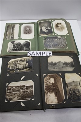 Lot 1146 - Postcards, album of real photographic early 20th century military including portraits, groups, parades, band, camps etc. Also album of loose mainly modern cards.