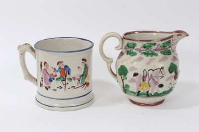 Lot 87 - 19th century Sunderland purple lustre jug, decorated in relief with an equestrian scene, and a pottery frog mug decorated with tavern scenes