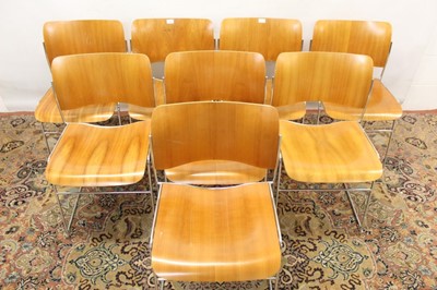 Lot 1354 - Set of eight Howe 40/4 plywood stacking chairs by David Rowland, bent ply back and seat on metal rod understructure, maker's labels to underside