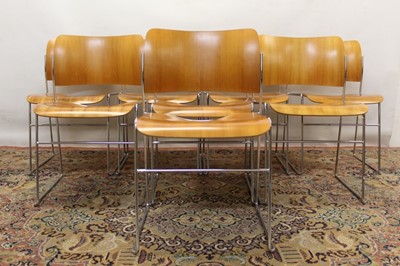 Lot 1354 - Set of eight Howe 40/4 plywood stacking chairs by David Rowland, bent ply back and seat on metal rod understructure, maker's labels to underside