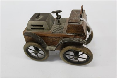 Lot 1612 - Scarce late 19th century novelty vesta box in the form of a veteran car with rising top enclosing compartment and striker on vulcanised rubber tyres 12cm