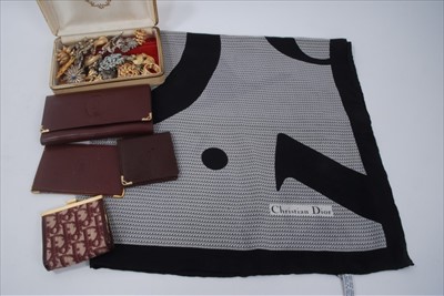 Lot 1697 - 1970s vintage Christian Dior silk scarf, Dior purse, Cartier purse and two wallets and vintage brooches