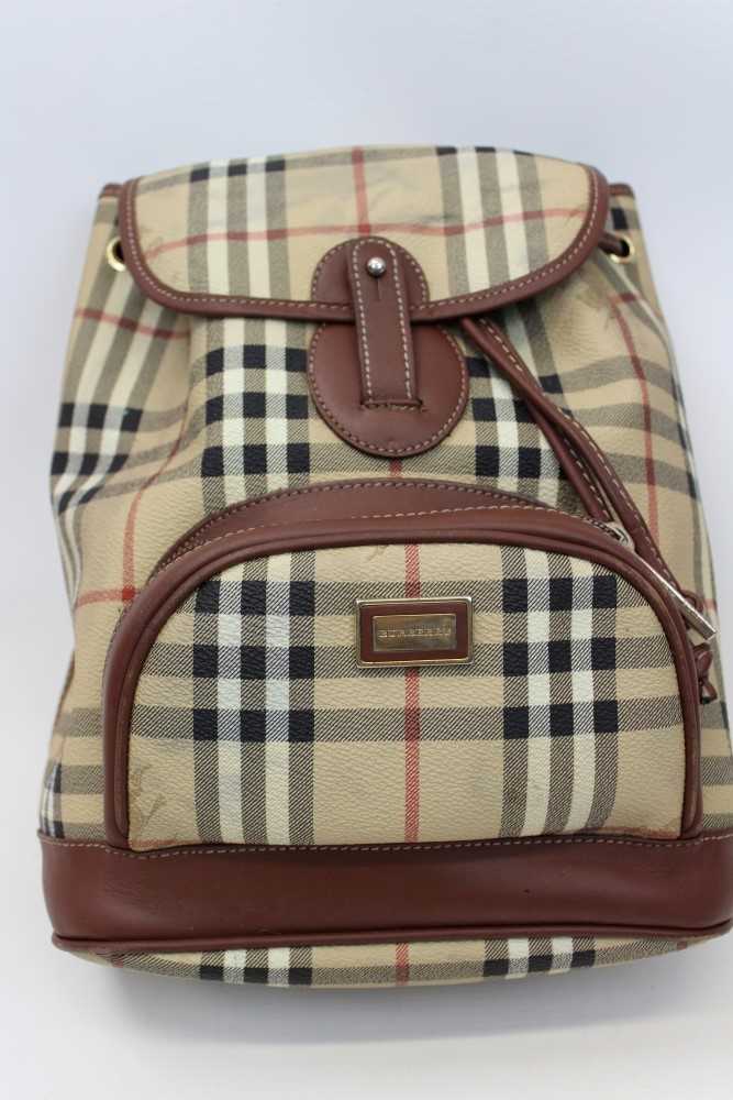 Lot 1705 - Burberry check leather rucksack with top stitched leather trims, adjustable fabric shoulder straps, press stud and draw string closure