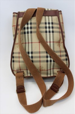 Lot 1705 - Burberry check leather rucksack with top stitched leather trims, adjustable fabric shoulder straps, press stud and draw string closure