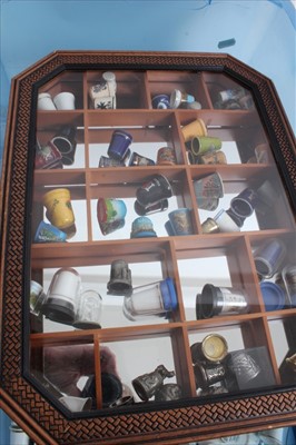 Lot 986 - Large collection of porcelain thimbles and two display cabinets