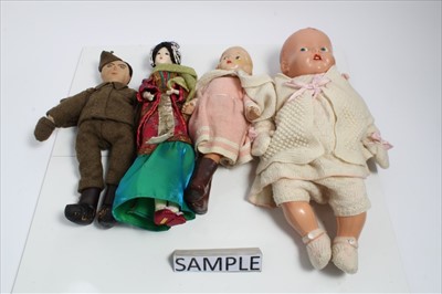 Lot 1402 - A collection of vintage fabric dolls and 1950s hard plastic dolls. Also some small Roddy dolls.