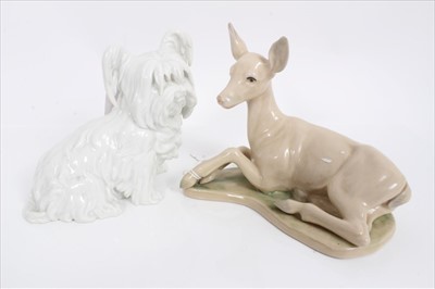 Lot 989 - Austrian Porcelain figure of a dog, with impressed marks '1631' and blue printed mark 'Wien' together with a Spanish porcelain model of a Deer (2)