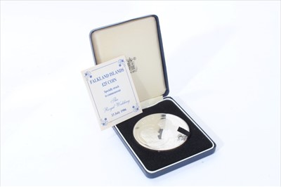 Lot 437 - Falklands - The Royal Mint issued £25 silver proof coin 'Prince Andrews Wedding' 1986 (weight 150gm) (cased with Certificate of Authenticity) (1 coin)