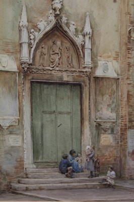 Lot 1099 - Walter Tyndale (1855-1943) watercolour - Figures before a church door, signed, in glazed gilt frame, 33cm x 24cm