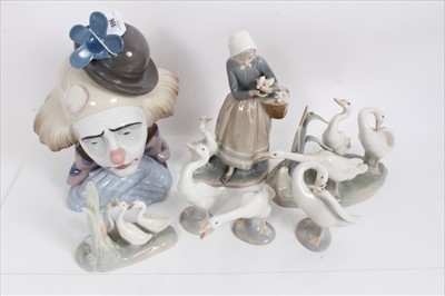 Lot 996 - Large Lladro porcelain clown bust, Lladro figure of lady with geese, four other Lladro geese and a similar Nao