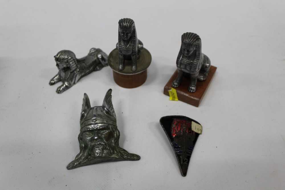 Lot 1634 - Group of Three Armstrong Siddley Sphinx Car mascots together with a Rover 12 badge and a Rover Mascot (5)