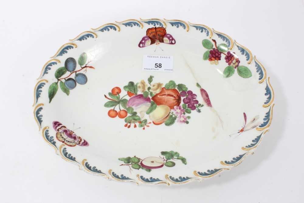 Lot 58 - Chelsea oval dish painted with fruits, butterflies, and leaves, circa 1760