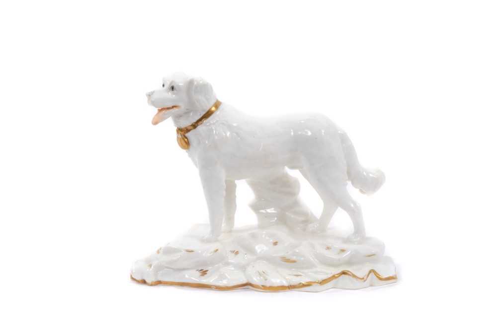 Lot 57 - Minton model of a Newfoundland, circa 1830-40, sparsely decorated in gilt and enamels, illustrated in DG Rice, Dogs in English Porcelain of the 19th century, colour plate 210, 9.5cm height