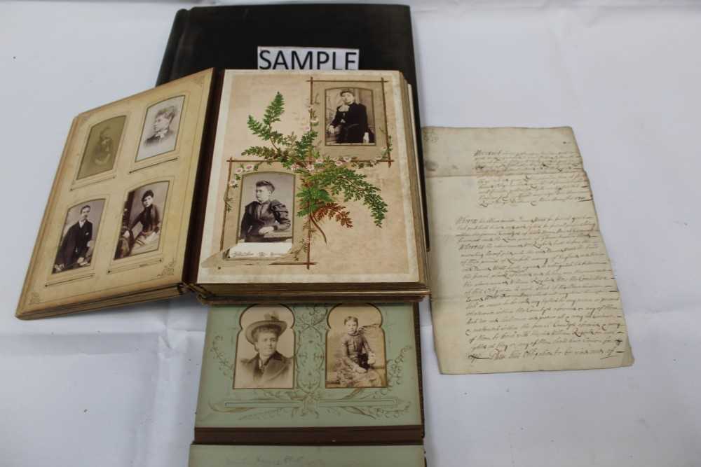 Lot 1204 - Two Victorian photograph albums containing carte de visites and cabinet cards. Plus some 18th and !9th century indentures.