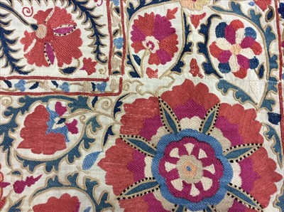 Lot 1704 - Antique / Vintage Turkish Suzani textile worked in panels and re-stitched together. Silk thread embroidery.