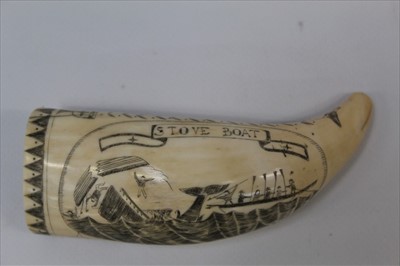 Lot 1952 - Antique Scrimshaw Whale tooth engraved on one side with a tall ship inscribed 'Cape Hope' and inscribed 'love boat' on reverse depicting