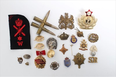 Lot 701 - Two First World War French Yellow metal sweetheart brooches, together with other military badges and buttons