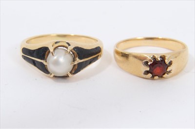 Lot 176 - Victorian gold pearl and black enamel mourning ring and a yellow metal ruby gypsy ring
