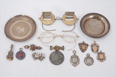 Lot 195 - Two Eastern white metal pin dishes, six silver fobs, brooches and two pairs vintage spectacles