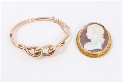 Lot 237 - 19th century Italian carved shell cameo brooch and a Victorian gold hinged bangle