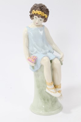 Lot 181 - Kathleen Goodwin for Wedgwood - porcelain figure of a seated girl with flowers