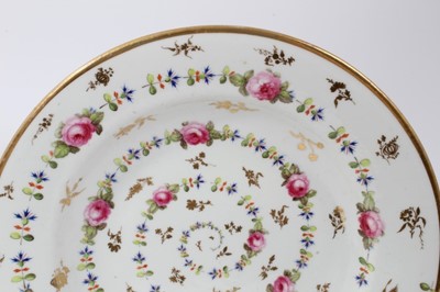Lot 93 - Two early 19th century Crown Derby dishes, both finely painted with floral patterns, marks underneath, 24.5cm diameter