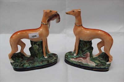 Lot 1008 - Pair of 19th Century Staffordshire figures of Greyhounds (2)