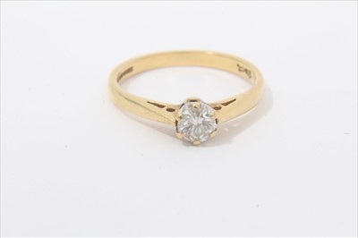 Lot 243 - 18ct gold diamond solitaire ring