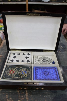 Lot 1429 - Victorian mahogany and brass playing card box with four compartments containing part sets, whist and bezique markers.