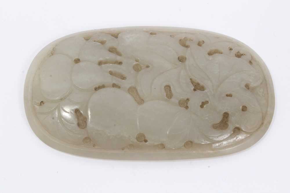 Lot 9 - Chinese jade caved oval plaque with engraved leaf and fruit decoration