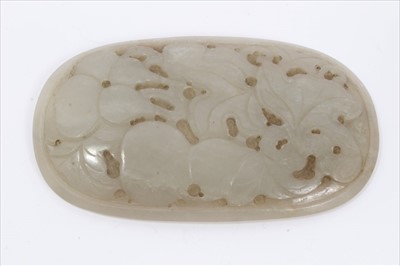 Lot 9 - Chinese jade caved oval plaque with engraved leaf and fruit decoration