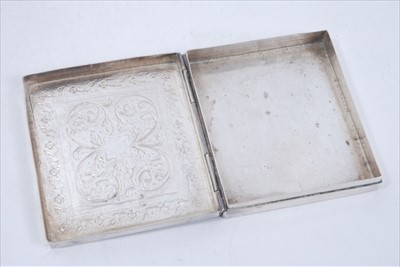 Lot 258 - Two Indian White metal boxes together with a similar cigarette case a match box cover and a napkin ring (5 pieces)