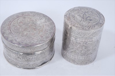 Lot 258 - Two Indian White metal boxes together with a similar cigarette case a match box cover and a napkin ring (5 pieces)