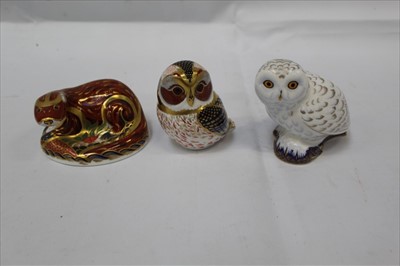 Lot 1014 - Three Royal Crown Derby paperweights - Otter, Snowy Owl and Tawny Owl