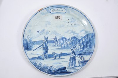 Lot 53 - Set of eight 19th century Dutch delft calendar plates, hand painted with various scenes, mark to bases, 23.5cm diameter