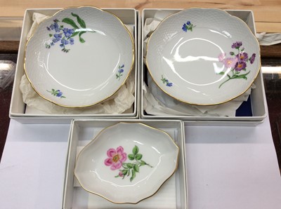 Lot 392 - Two contemporary Meissen saucers and one other Meissen pin dish, all boxed (3)