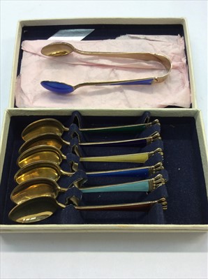 Lot 690 - Set six Danish sterling silver gilt enamelled coffee spoons and pair sugar tongs