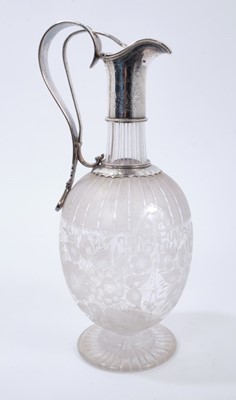 Lot 332 - Victorian etched glass claret jug with silver plated mount