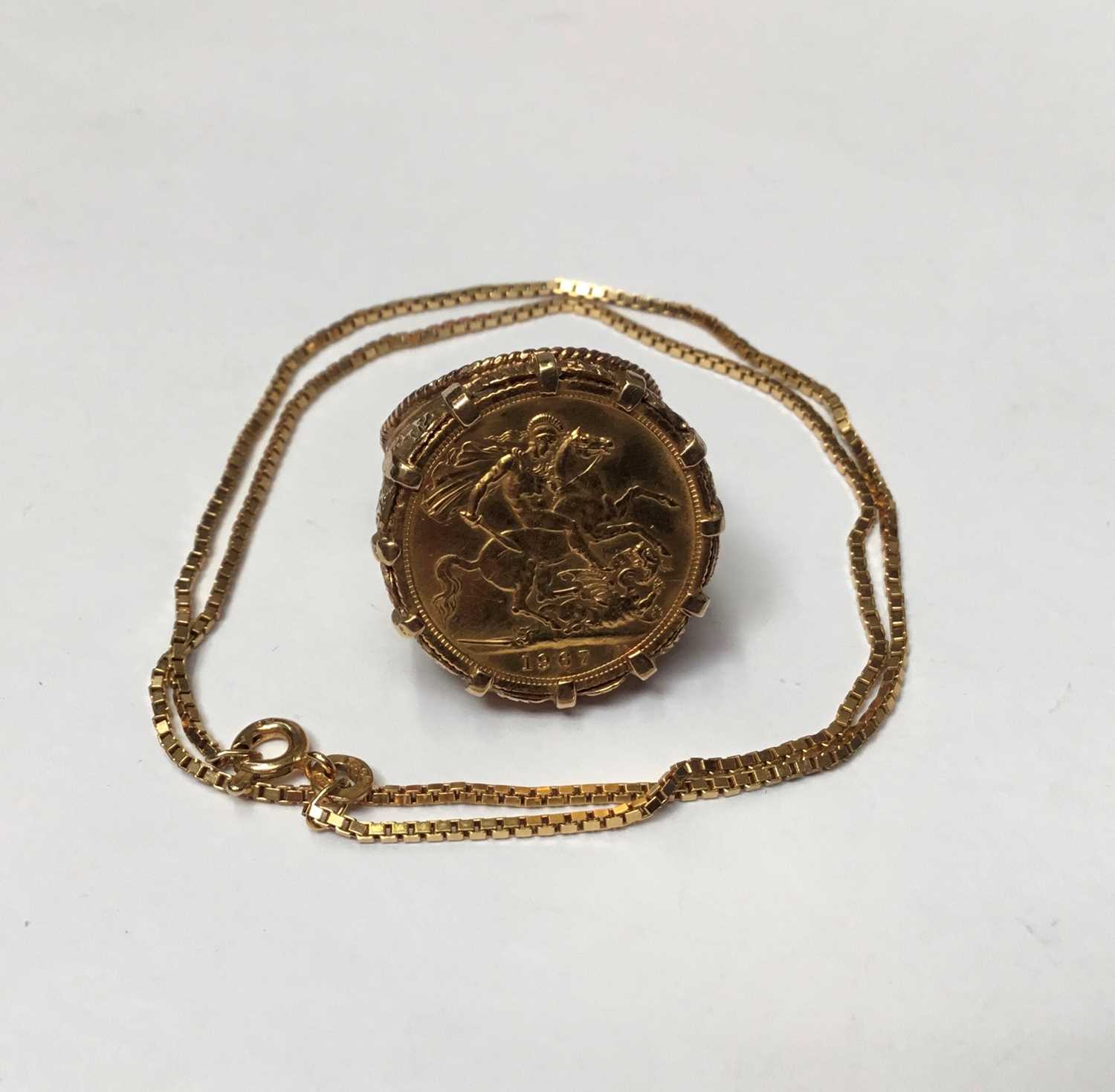 Lot 162 - Gold full sovereign 1967 in gold ring mount together with a 9ct gold chain