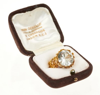 Lot 521 - John Donald - a 1970s 18ct gold and gem set dress ring