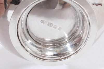 Lot 242 - Contemporary Guild of Handicraft silver dish of circular form.