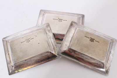 Lot 273 - Set of three Tiffany silver matchbox holders and three silver ashtrays in original  pochettes.