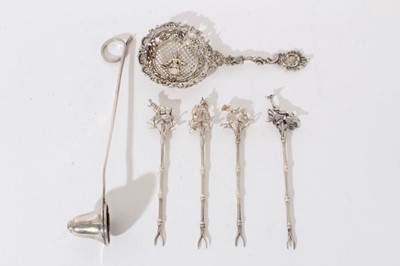 Lot 274 - Set of four silver pickle forks, together with a Dutch spoon, and a candle snuffer
