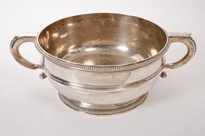 Lot 252 - Large Edwardian silver two handled punch bowl of circular form.