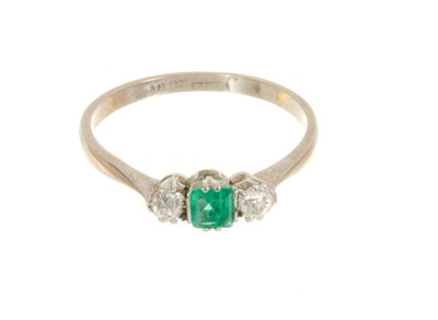 Lot 406 - Emerald and diamond three stone ring