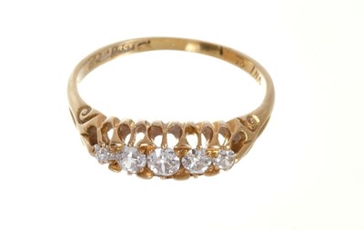 Lot 409 - Early 20th century diamond five stone ring dated 1912