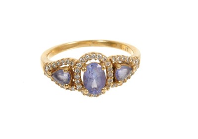 Lot 434 - 18ct gold tanzanite and diamond cluster ring