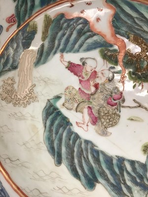 Lot 96 - Large late 19th century Chinese famille rose porcelain bowl, decorated with figures and a floral patterned rim, 41cm diameter