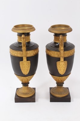 Lot 701 - Pair of 19th century Grand Tour patinated bronze urns
