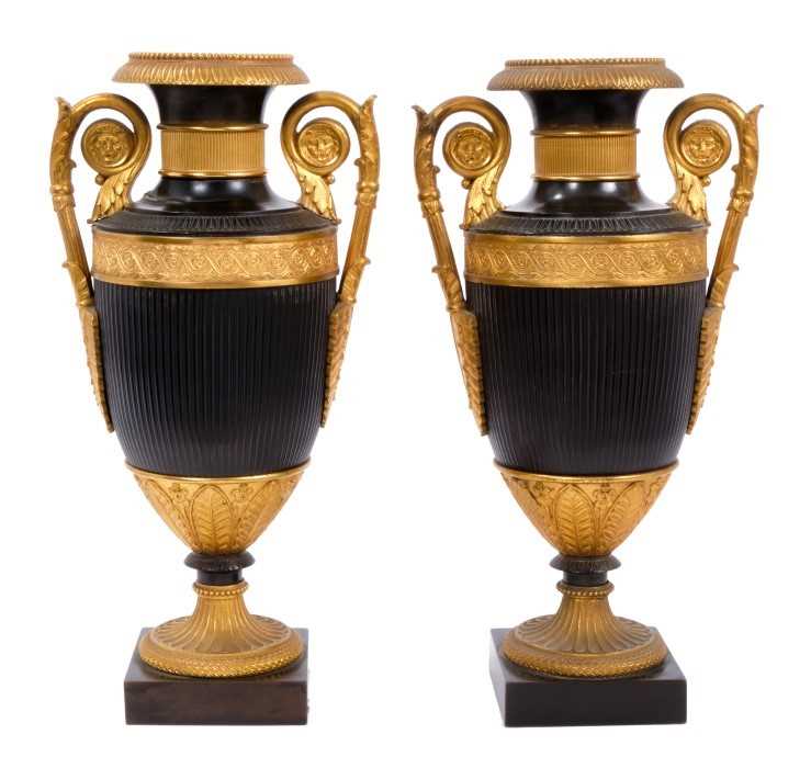 Lot 701 - Pair of 19th century Grand Tour patinated bronze urns